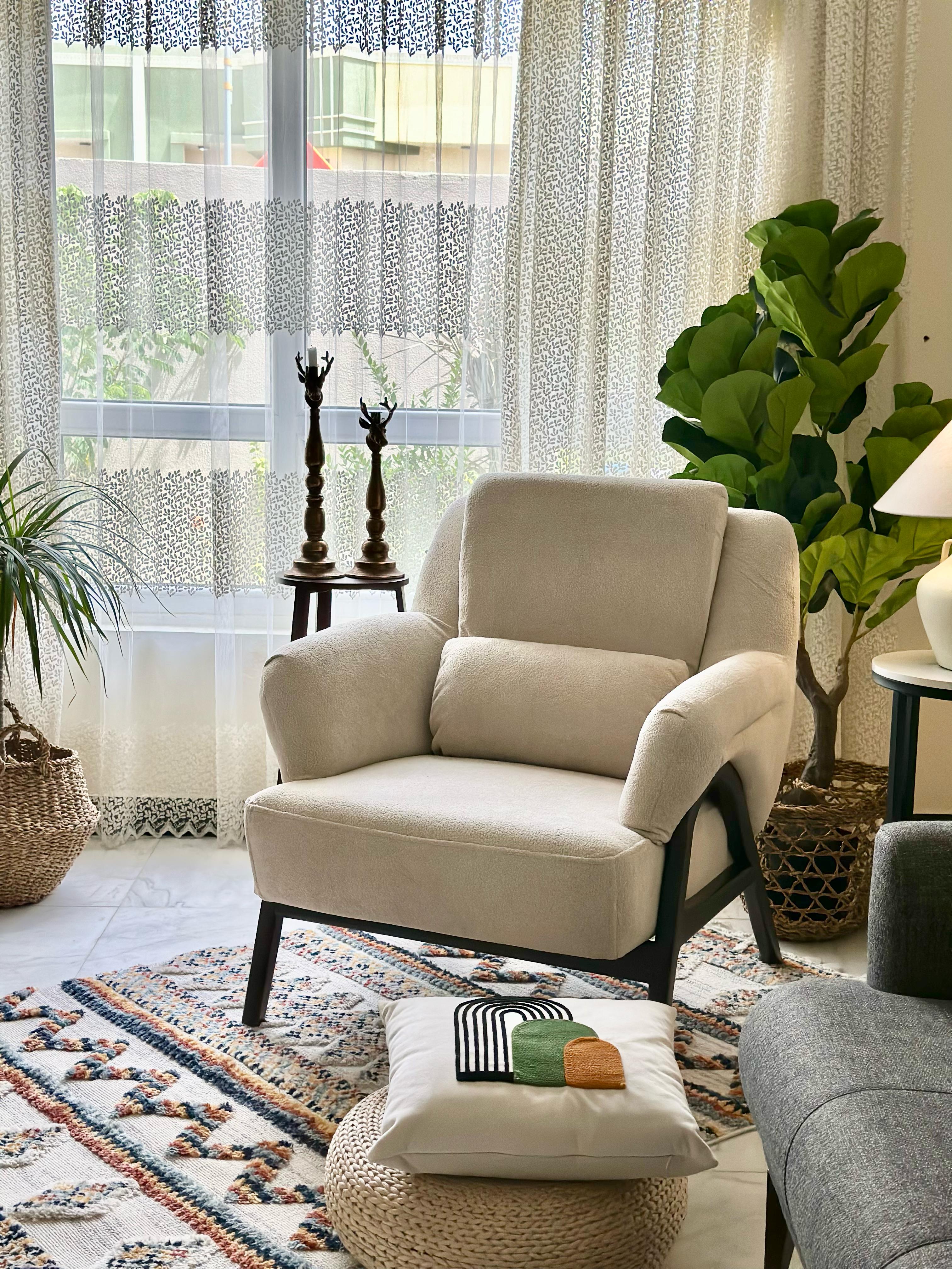 Beige Armchair with Black Wood Frame – Modern Lounge Comfort